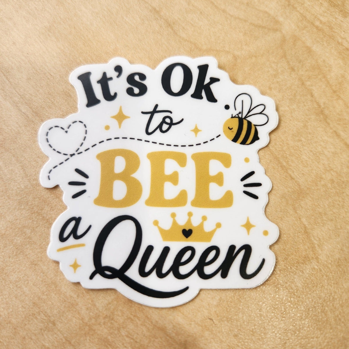 It’s OK to Bee a Queen black, white, and gold die-cut sticker